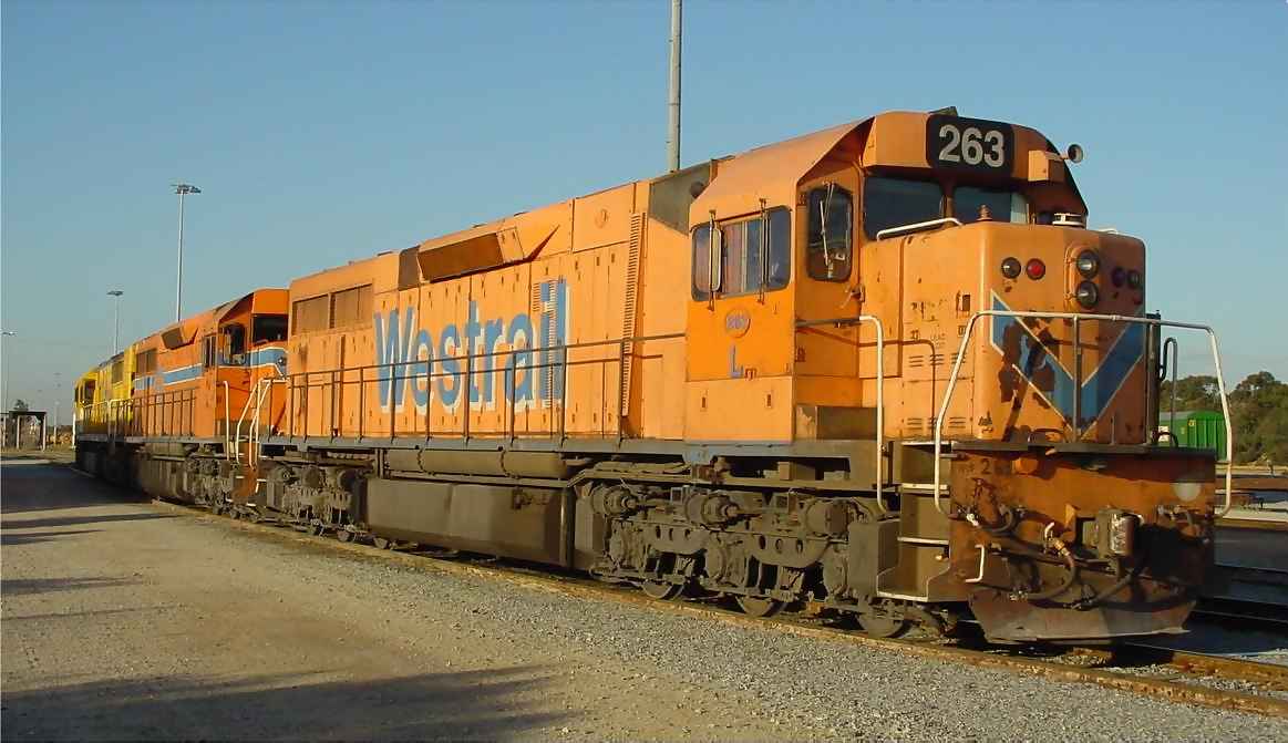 A pair of original Westrail orange L class with the Westrail logo still intact. L263 and L261 stand idling at Forrestfield on 8 November 2001 